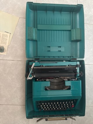 Máquina de escribir portátil verde