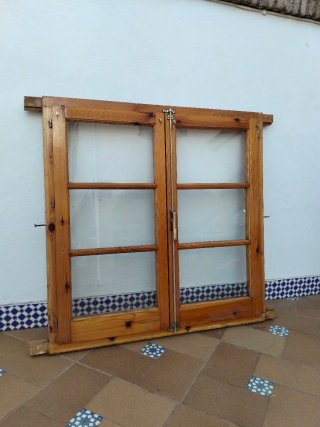 Ventanas dobles madera con cristales.