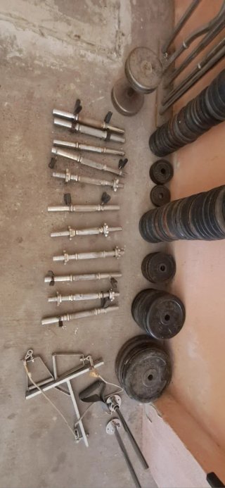Lote de pesas, barras,discos,bancos Escucho oferta