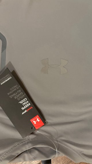 Tuta corta Under Armour grigia