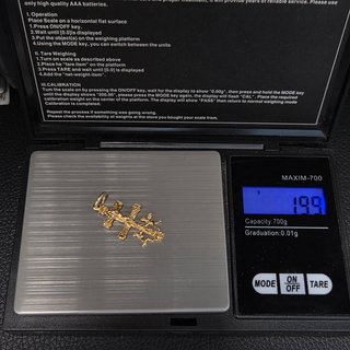 Colgante Cruz Caravaca oro de 18k. 1.99 gr.