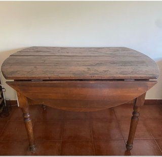 Mesa de comedor extensible antigua de madera