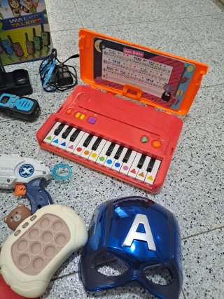 Lote de Juguetes: Walkie Talkies, Teclado, Pistola