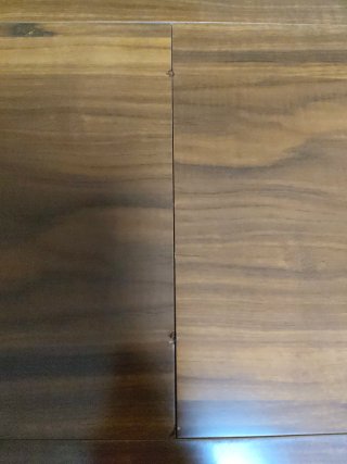 Mesa de comedor redonda extensible de madera