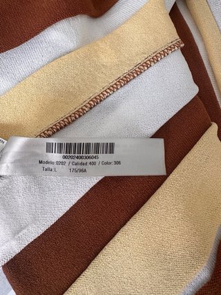 UTERQUE vestido de punto midi con falda tableada