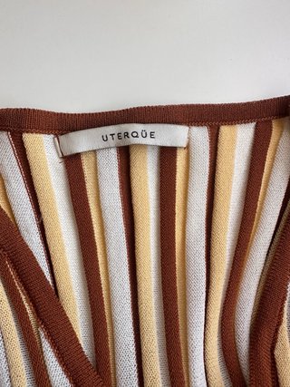 UTERQUE vestido de punto midi con falda tableada