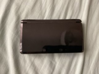 Nintendo 3DS Nera + Caricabatterie + Giochi LEGGI