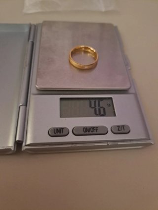 Alianza oro de 18 kilates.