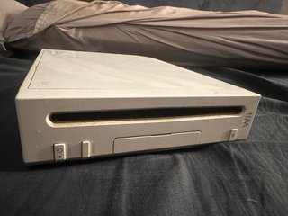 wii blanca, con cables + 24 juegos