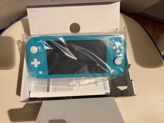 Nintendo Switch Lite Turchese NUOVA Mai Usata
