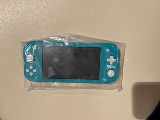 Nintendo Switch Lite Turchese NUOVA Mai Usata