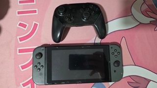 Nintendo Switch HAC-001 con Joy-Con Grises + mando