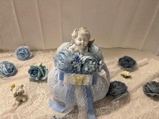 Pouf azzurro artigianale con angioletto