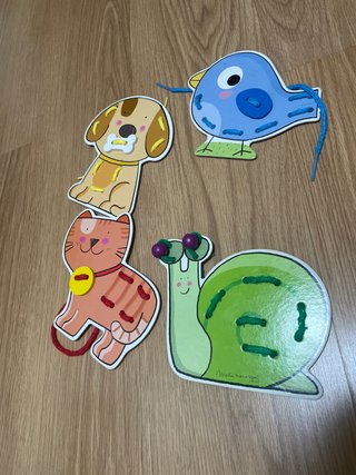 Juego de enhebrar animales
