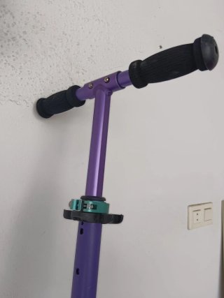 Patinete morado y verde