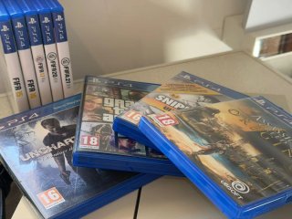 PS4 Blanca con 2 Mandos y Juegos