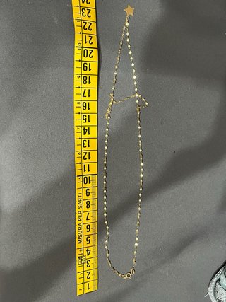 Collana in oro 9k con ciondolo a stella