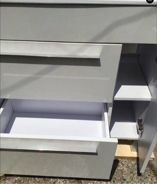 Mueble de baño, lavabo y espejo