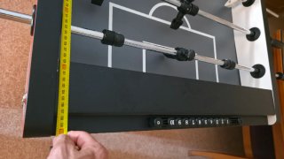 Futbolín de mesa rojo y negro nuevo.