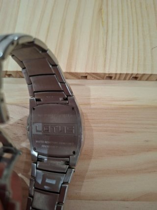 Reloj Lotus Naranja y Plateado