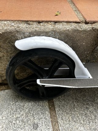 Patinete plegable blanco con freno de pie
