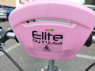 Bicicleta infantil rosa y negra