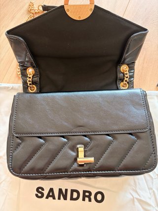 Bolso Sandro negro y dorado