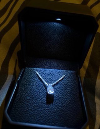 Diamante natural con certificado  oro blanco14k