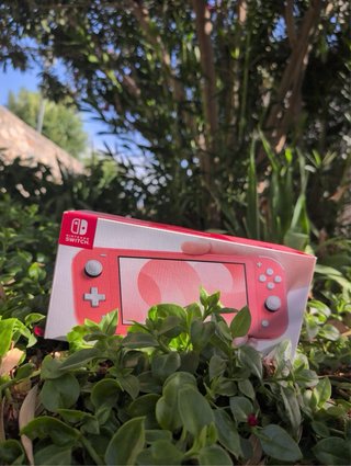 Nintendo Switch Lite Coral + Cargador Nuevo