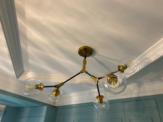 Lámpara de diseño colgante dorada y cristal