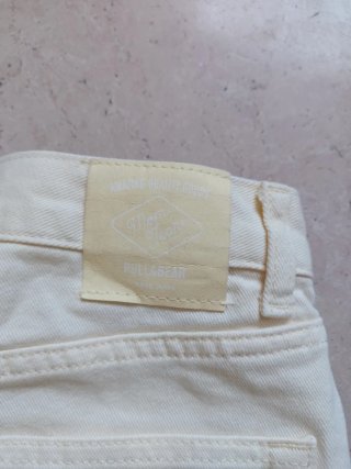 Pantaloncini jeans beige corti