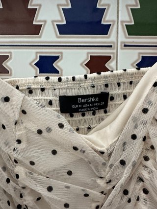 Top lunares beige y negro