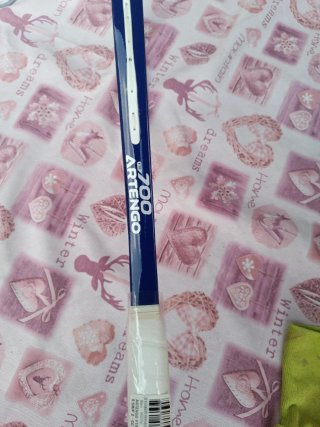 Raqueta de frontenis azul y blanca