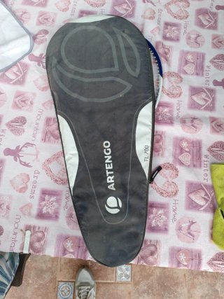Raqueta de frontenis azul y blanca