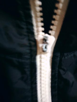 Chaqueta Nike Negra con Ribete Blanco