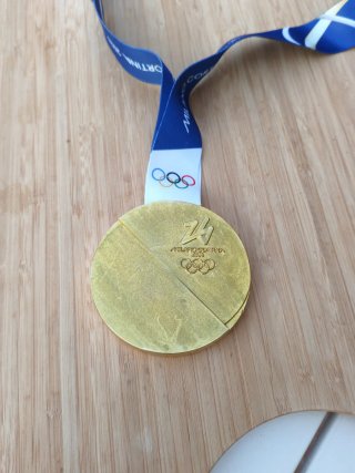 Medalla Juegos Olímpicos Milano Cortina 2026