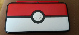 Nintendo 2DS XL Pokémon + 8 juegos