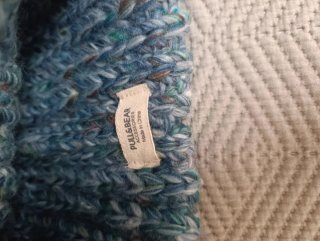 Set 2 gorros de lana con pompón (azul y rosa).