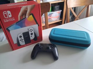 Nintendo Switch OLED Blanca + mando Pro + Caja Org