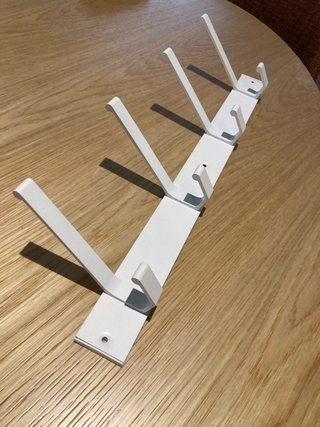 Colgador de pared 4 ganchos