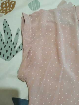 Blusa rosa con estrellas blancas Talla M
