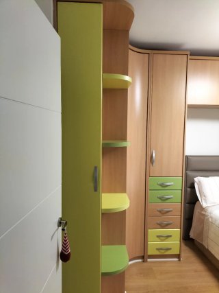 Armario modular curvo habitación