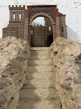 Belén romano: Castillo sobre montaña