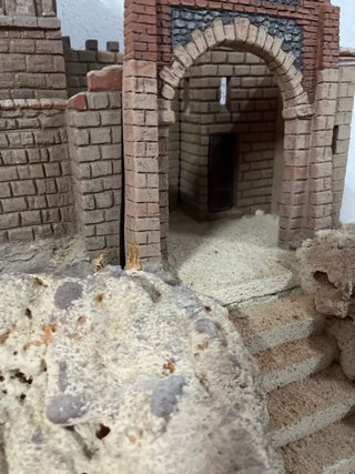 Belén romano: Castillo sobre montaña
