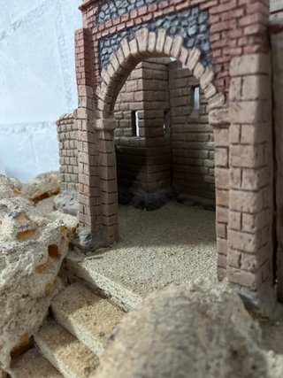 Belén romano: Castillo sobre montaña