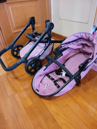 Carrito de muñecas rosa