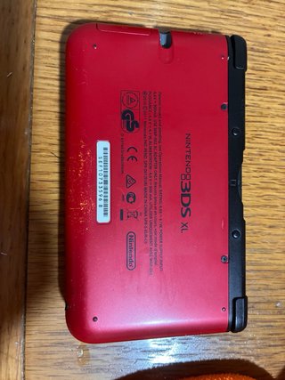 Nintendo 3DS XL Rossa e Nera + gioco mario bros