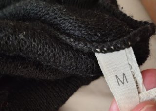 Maglione nero con stampa geometrica taglia M
