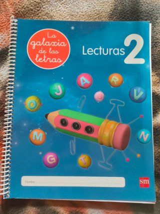Cartilla de lectura y libro de lengua.