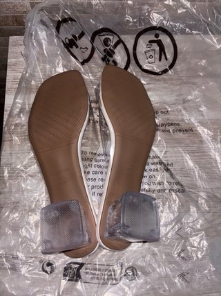 Zapatilla transparente blanca